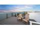 Rooftop deck with chairs offering relaxing water views at 116 8Th Street S, Bradenton Beach, FL 34217