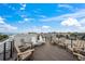 Spacious rooftop deck with comfortable seating and water views at 116 8Th Street S, Bradenton Beach, FL 34217