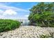 Scenic waterfront view with natural landscaping at 116 8Th Street S, Bradenton Beach, FL 34217
