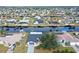 Spacious home and neighborhood view from above at 128 Sinclair Se St, Port Charlotte, FL 33952