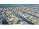 Aerial view showcasing the property's desirable waterfront location at 128 Sinclair Se St, Port Charlotte, FL 33952