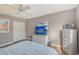 Guest bedroom with a queen-size bed and ample closet space at 128 Sinclair Se St, Port Charlotte, FL 33952