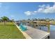 Relaxing dockside view overlooking the canal at 128 Sinclair Se St, Port Charlotte, FL 33952