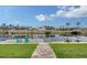 Private dock with canal access and seating at 128 Sinclair Se St, Port Charlotte, FL 33952