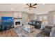 Spacious living room featuring a fireplace and comfortable seating at 128 Sinclair Se St, Port Charlotte, FL 33952