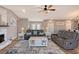 Relaxing living room with gray couches and coffee table at 128 Sinclair Se St, Port Charlotte, FL 33952