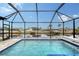 Enclosed pool with waterfront views at 128 Sinclair Se St, Port Charlotte, FL 33952