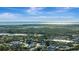 Stunning aerial view of the community and surrounding area at 144 Wild Palm Dr, Bradenton, FL 34210