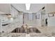 Modern kitchen with granite countertops and stainless steel sink at 144 Wild Palm Dr, Bradenton, FL 34210