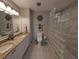 Bathroom boasts double sinks and a glass block shower at 1552 Stickney Point Rd # 403, Sarasota, FL 34231