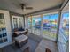 Bright sunroom offering stunning canal views at 1552 Stickney Point Rd # 403, Sarasota, FL 34231