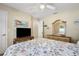 Bedroom with a TV and dresser at 1577 Taggard Rd, North Port, FL 34288
