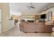 Living area with view into dining room and sliding doors to patio at 1577 Taggard Rd, North Port, FL 34288
