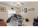 Home office with desk, computer, and guitar at 1577 Taggard Rd, North Port, FL 34288