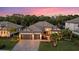 Luxury home with three-car garage and beautiful landscaping at 16203 Tradewind Ter, Lakewood Ranch, FL 34211