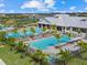 Community pool area with plenty of lounge chairs at 16203 Tradewind Ter, Lakewood Ranch, FL 34211