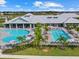 Large community pool with lap lanes and lounging areas at 16203 Tradewind Ter, Lakewood Ranch, FL 34211