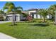 Stunning curb appeal with lush landscaping at 16203 Tradewind Ter, Lakewood Ranch, FL 34211