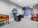 Entertain in a game room with racing games and pinball at 16203 Tradewind Ter, Lakewood Ranch, FL 34211