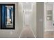 Bright hallway with carpet flooring and access to other rooms at 16203 Tradewind Ter, Lakewood Ranch, FL 34211