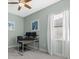 Home office with a desk, two monitors, and window at 16203 Tradewind Ter, Lakewood Ranch, FL 34211