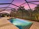 Inviting screened pool and spa with ample deck space at 16203 Tradewind Ter, Lakewood Ranch, FL 34211