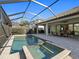 Spacious pool and spa with a covered patio at 16203 Tradewind Ter, Lakewood Ranch, FL 34211