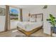 Cozy bedroom with a queen-size bed and a unique headboard at 1740 Maryknoll Rd, Englewood, FL 34223