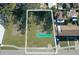 Vacant lot ready for new construction, near existing homes at 1744 10Th St, Sarasota, FL 34236