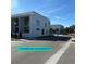 Modern townhouses in a new development, showcasing clean lines and bright exteriors at 1744 10Th St, Sarasota, FL 34236