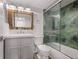 Updated bathroom with walk-in shower and stylish vanity at 1751 Beach Rd # 404, Englewood, FL 34223