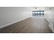 Spacious living room with large windows and waterfront views at 1751 Beach Rd # 404, Englewood, FL 34223