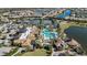 Community clubhouse with pool and tennis courts at 17530 Northwood Pl, Bradenton, FL 34202