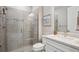 Modern bathroom with a glass shower and white vanity at 17530 Northwood Pl, Bradenton, FL 34202