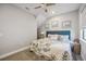 Bright bedroom with a king-size bed and ceiling fan at 17530 Northwood Pl, Bradenton, FL 34202