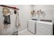 Convenient laundry room with washer, dryer, and storage at 17530 Northwood Pl, Bradenton, FL 34202