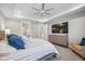Main bedroom with king bed, TV, and access to the en-suite bathroom at 17530 Northwood Pl, Bradenton, FL 34202