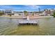 Community waterfront view with private dock and neighboring homes at 2107 Palma Sola Blvd # 82, Bradenton, FL 34209