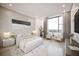 Bright bedroom with large window, comfy bed, and stylish decor at 2194 Fruitville Rd, Sarasota, FL 34237