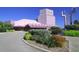 Pink building exterior with landscaping and unique design at 2194 Fruitville Rd, Sarasota, FL 34237