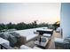 Private rooftop terrace with hot tub and seating area at 2194 Fruitville Rd, Sarasota, FL 34237
