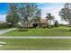 Single story house exterior with landscaping and driveway at 22623 Morning Glory Cir, Bradenton, FL 34202