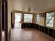 Large living area with tiled floors, needs renovation at 2601 Gulf N Dr # B16, Bradenton Beach, FL 34217