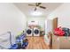 Laundry room with washer, dryer, and cabinets at 27425 Jones Loop Rd, Punta Gorda, FL 33982