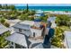 Modern home with rooftop deck and ocean views at 3015 Avenue E, Holmes Beach, FL 34217