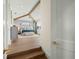 Main bedroom with a canopy bed and hardwood floors at 3015 Avenue E, Holmes Beach, FL 34217