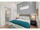 Spacious bedroom with ensuite bathroom and stylish decor at 3015 Avenue E, Holmes Beach, FL 34217