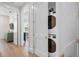 Convenient laundry closet with stackable washer and dryer at 3015 Avenue E, Holmes Beach, FL 34217