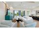 Open living space with stylish seating and kitchen views at 3015 Avenue E, Holmes Beach, FL 34217