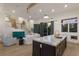 Open living room and kitchen with high ceilings and modern decor at 3015 Avenue E, Holmes Beach, FL 34217